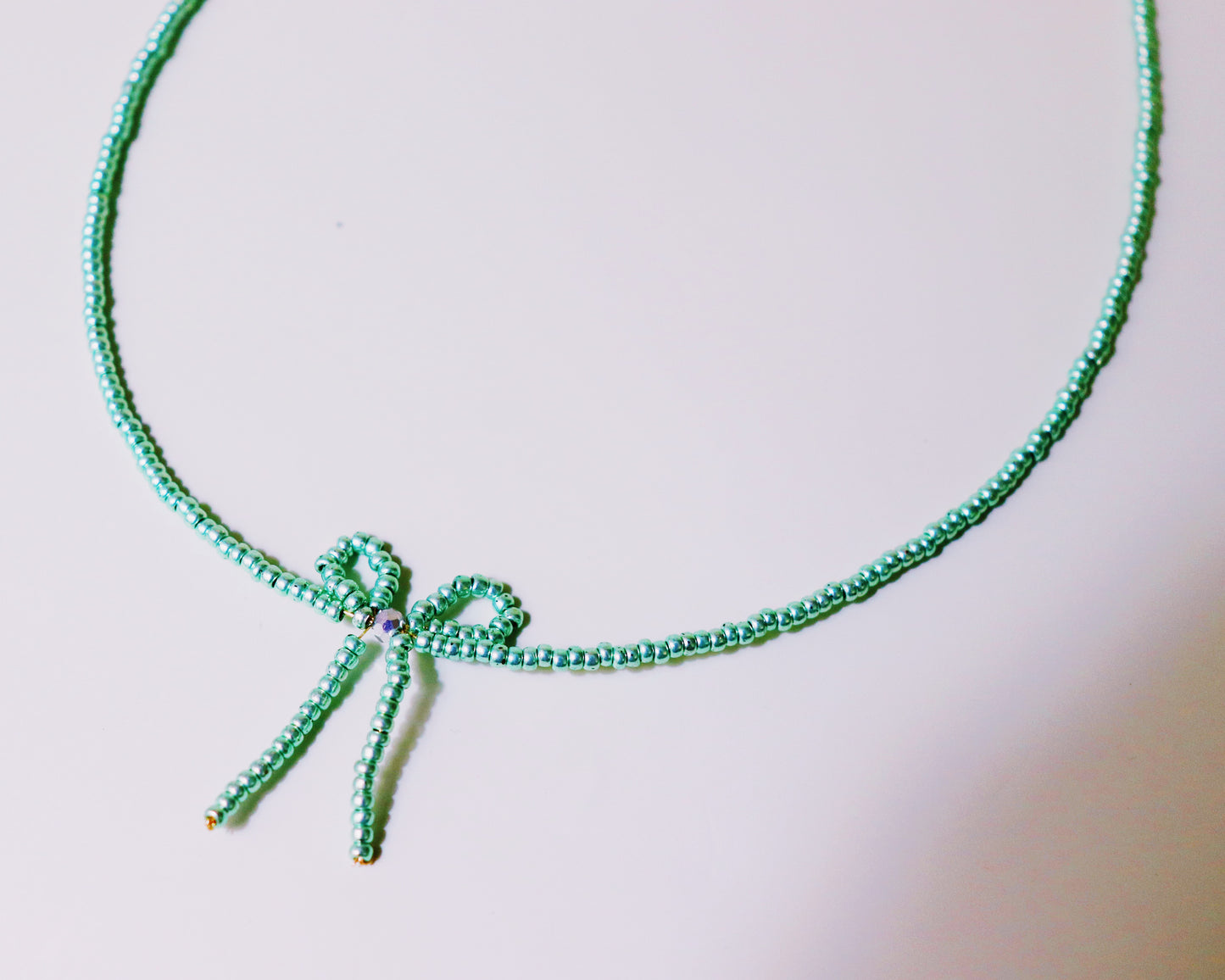 BOW-TIFIL GREEN NECKLACE